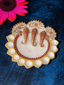 Decorative Pooja Plate With 11 Diya Holders And Central Elephant Design Pattern