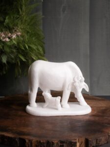 White marble Kamdhenu Cow with calf statue