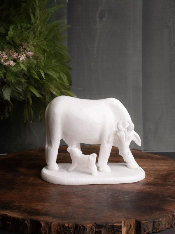 White marble Kamdhenu Cow with calf statue
