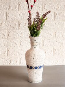 Marble vase with floral inlay
