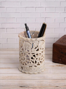 Beige soapstone pen stand with flowers