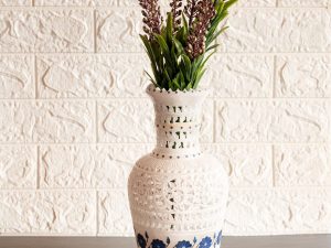 Marble vase with floral inlay