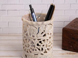 Beige soapstone pen stand with flowers
